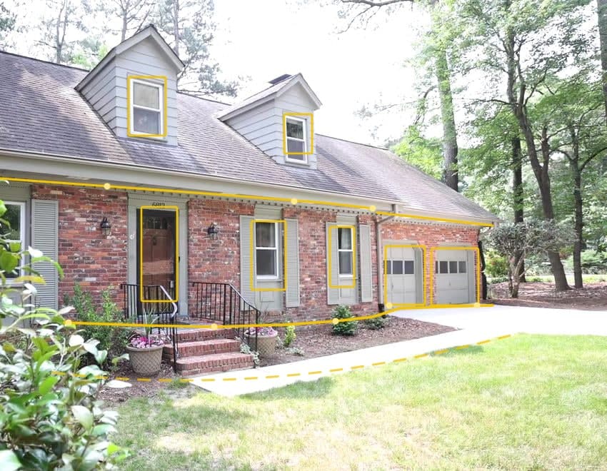 The same home after treatment — a yellow line traces the foundation, eaves, entry points, windows, doors and garage
